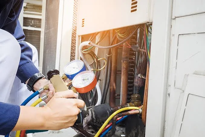 Heating equipment during routine HVAC maintenance